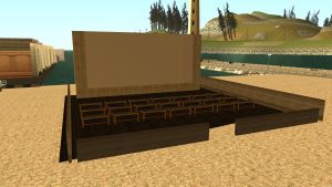 Outdoor cinema screen and seating area
