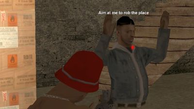 A robber holding up a shopkeeper during a store robbery